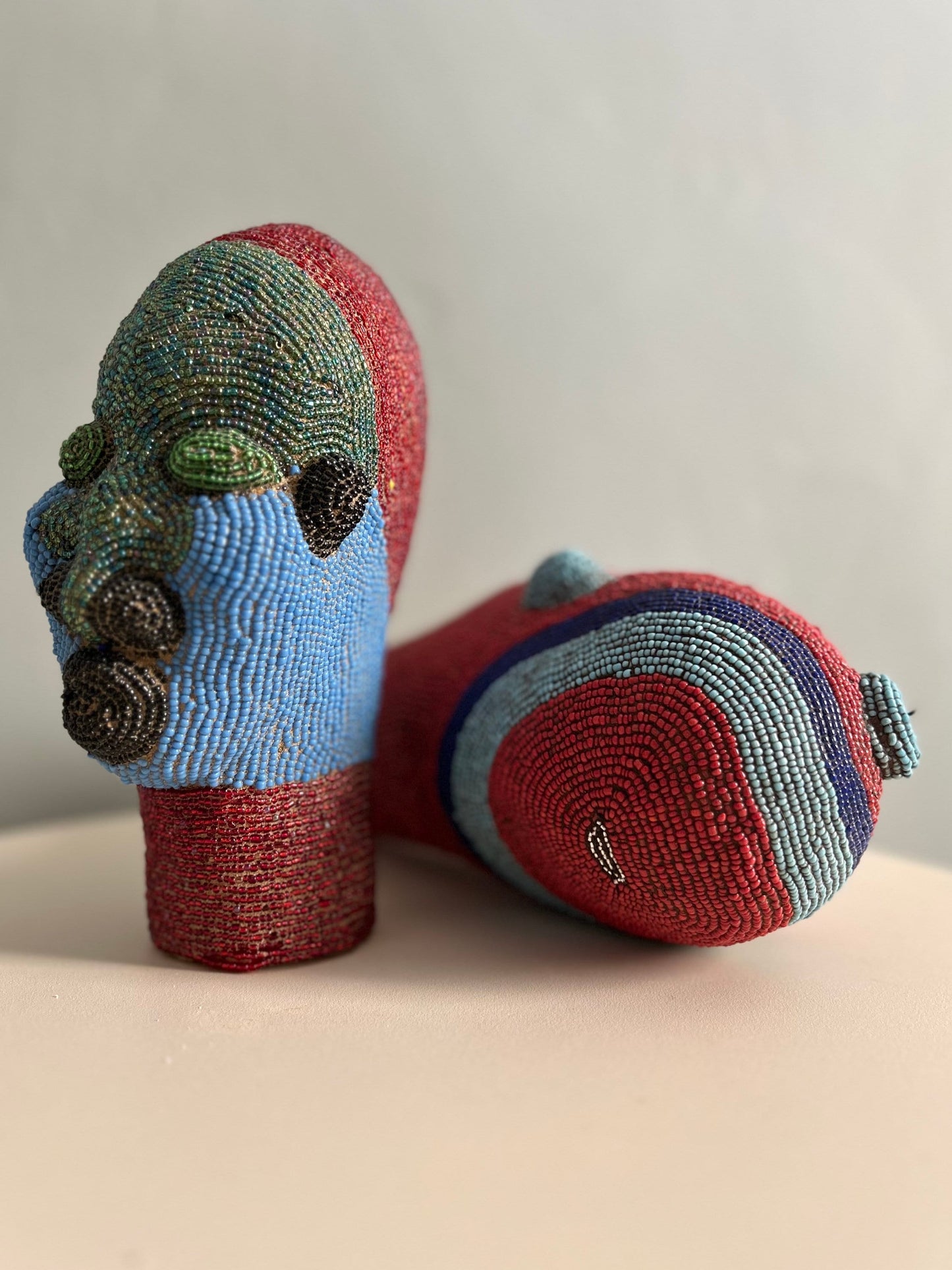 Unique Green and Red Cameroon Beaded Head