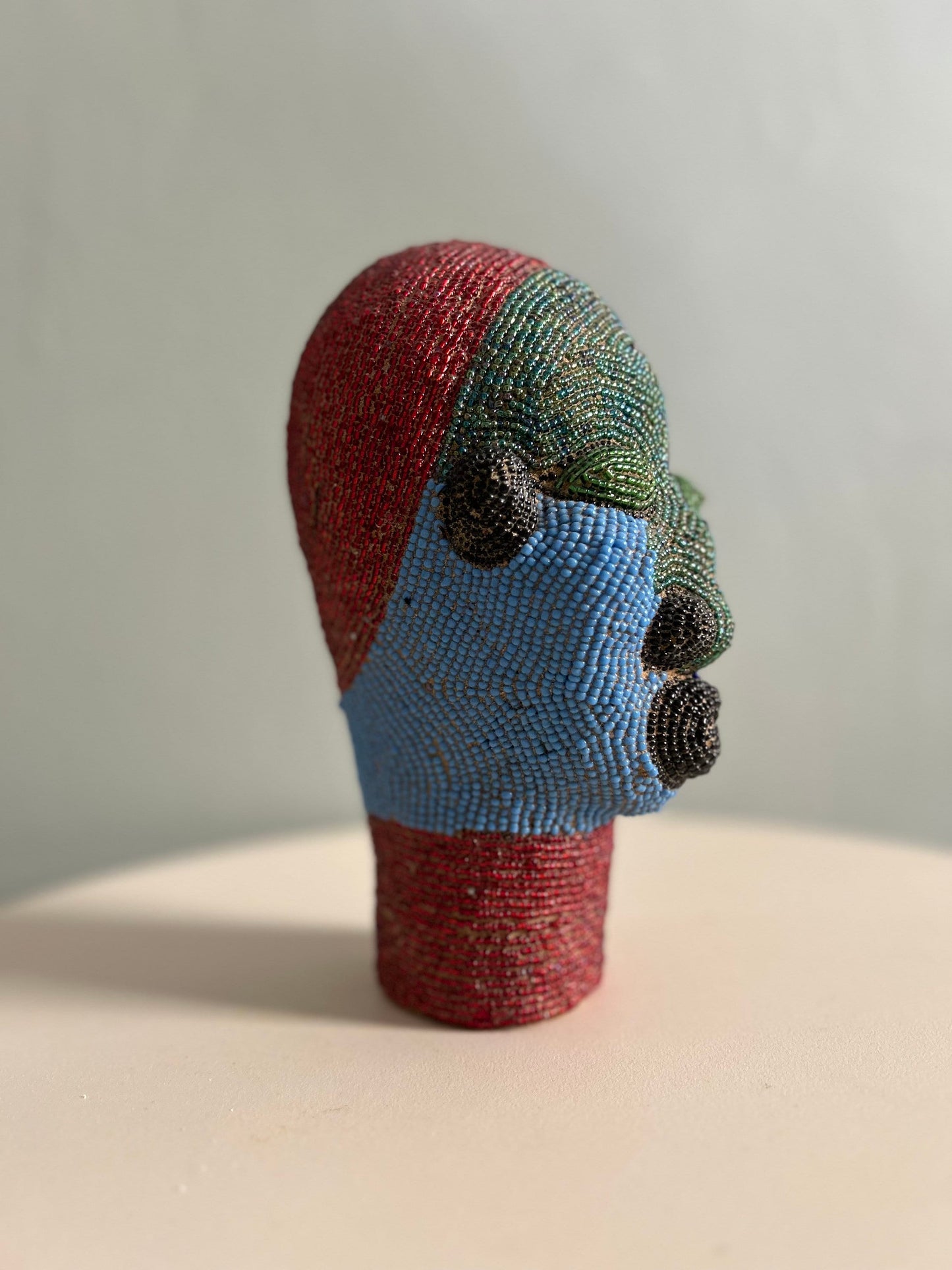Unique Green and Red Cameroon Beaded Head
